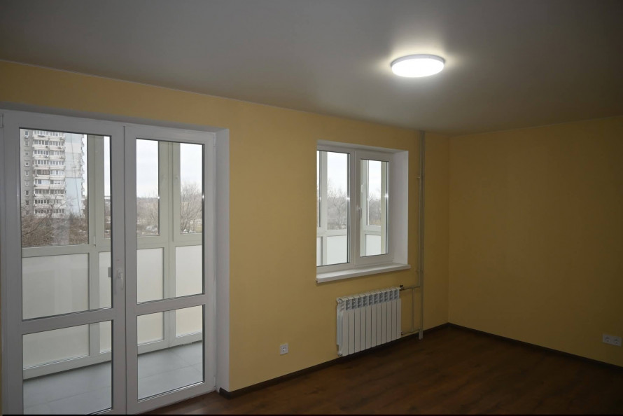 Повернення додому: у Запоріжжі мешканці отримали ключі від відновлених квартир (фото, відео)