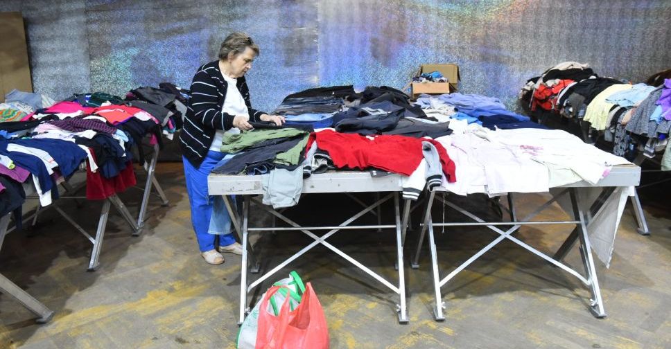 Переселенцям, які знайшли прихисток у Запоріжжі, безкоштовно видають теплий одяг і взуття — фото