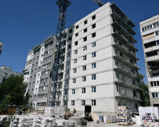 Відновили стіни та ремонтують балкони - як просувається відбудова двох багатоповерхівок на вулиці Запорізькій (фото)
