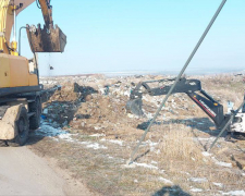 Кінець історії -  між двома селами у Запорізькому районі засипали півстолітнє сміттєзвалище (фото, відео)