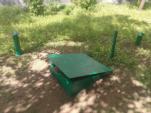 У Запоріжжі відновлюють дорогу, яку зруйнували любителі підземних сховищ (фото)