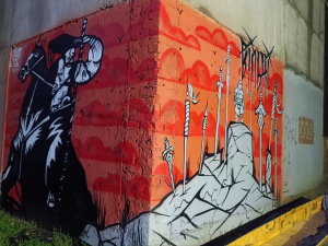 Козак і криваві сльози - запорізькі художники розписали старовинний елеватор, пошкоджений ворожою ракетою