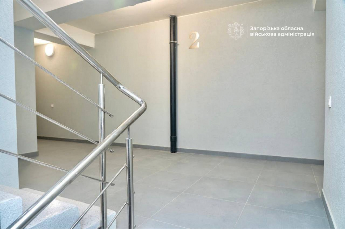 Повернення додому: у Запоріжжі мешканці отримали ключі від відновлених квартир (фото, відео)